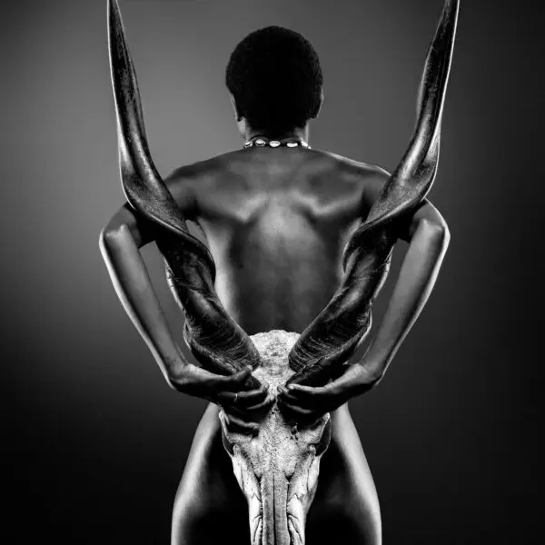 Art photography a person holding a skull